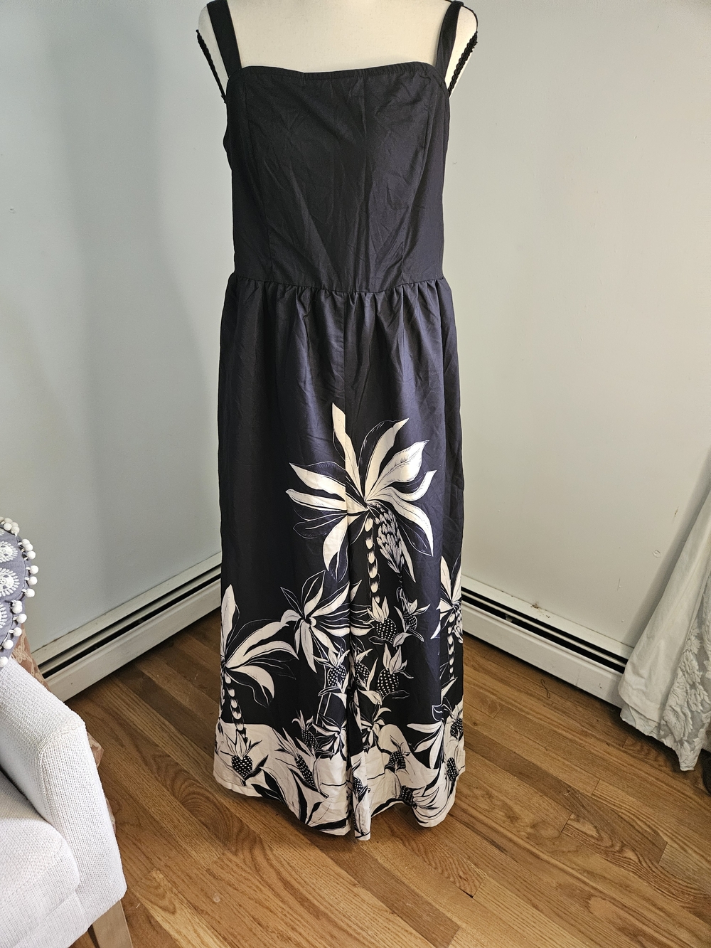 Women's Navy Jumpsuit with White Floral Print.